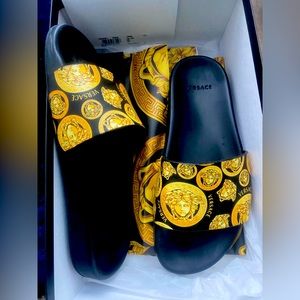 Authentic Versace Slides Size 8 comes with original box.